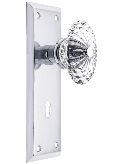 New York Plate with Oval Fluted Crystal Knob with Keyhole in Polished Chrome.